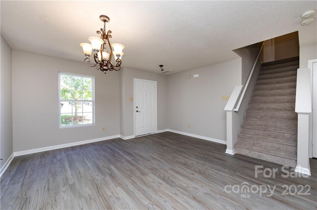 776 Ladino Lane Clover, SC 29710 - Photo 7 of 44 wooden floor in an empty room with a window
