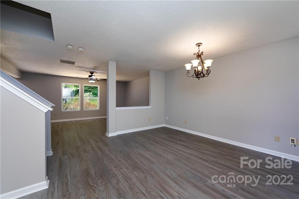 776 Ladino Lane Clover, SC 29710 - Photo 9 of 44 wooden floor in an empty room with a window