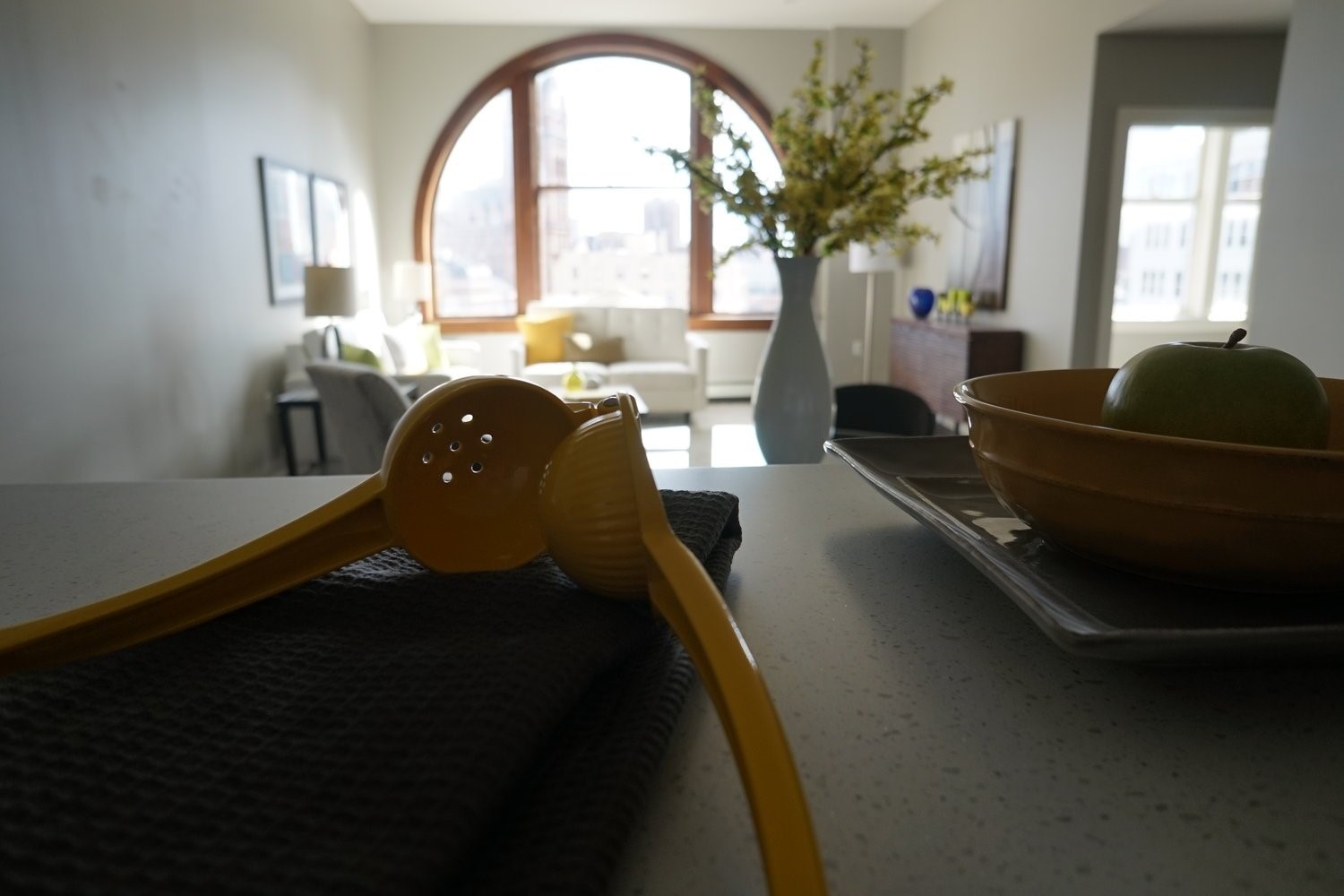 135 West Wells Street Milwaukee, WI 53203 - Photo 12 of 13 a living room with furniture and a large window