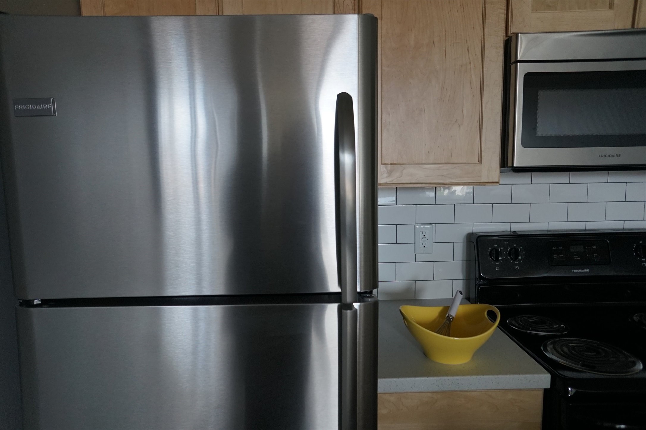 135 West Wells Street Milwaukee, WI 53203 - Photo 13 of 13 a kitchen with a refrigerator and a stove