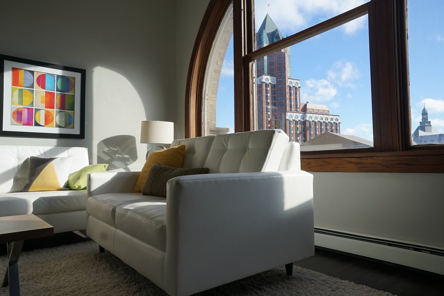 135 West Wells Street Milwaukee, WI 53203 - Photo 6 of 13 a living room with furniture and a large window