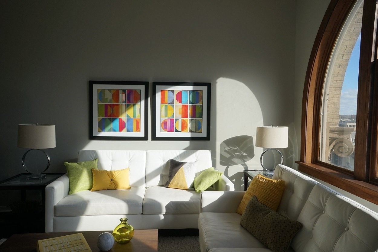 135 West Wells Street Milwaukee, WI 53203 - Photo 7 of 13 a living room with furniture and a large window