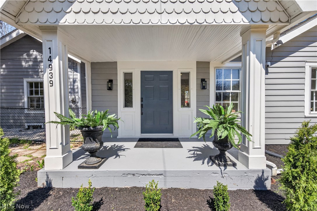 14939 Caves Road Novelty, OH 44072 - Photo 2 of 42 View of exterior entry featuring covered porch