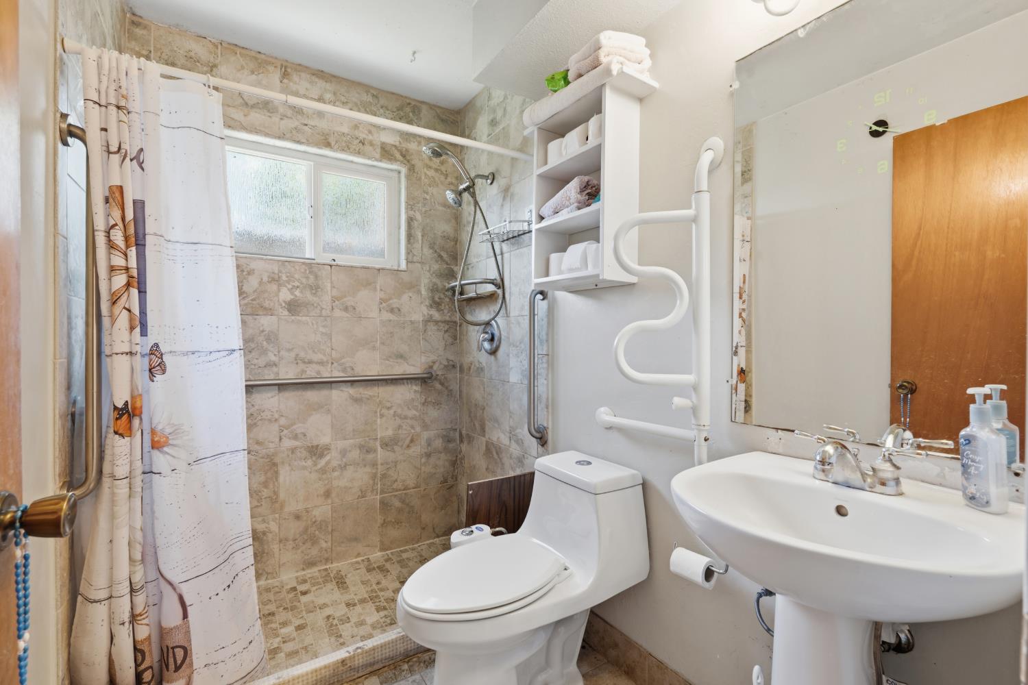 3356 Ocotillo Way Modesto, CA 95355 - Photo 17 of 33 a bathroom with a sink toilet and shower