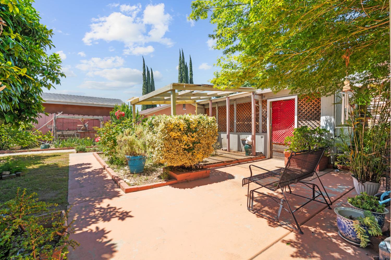 3356 Ocotillo Way Modesto, CA 95355 - Photo 24 of 33 a view of a house with backyard and garden