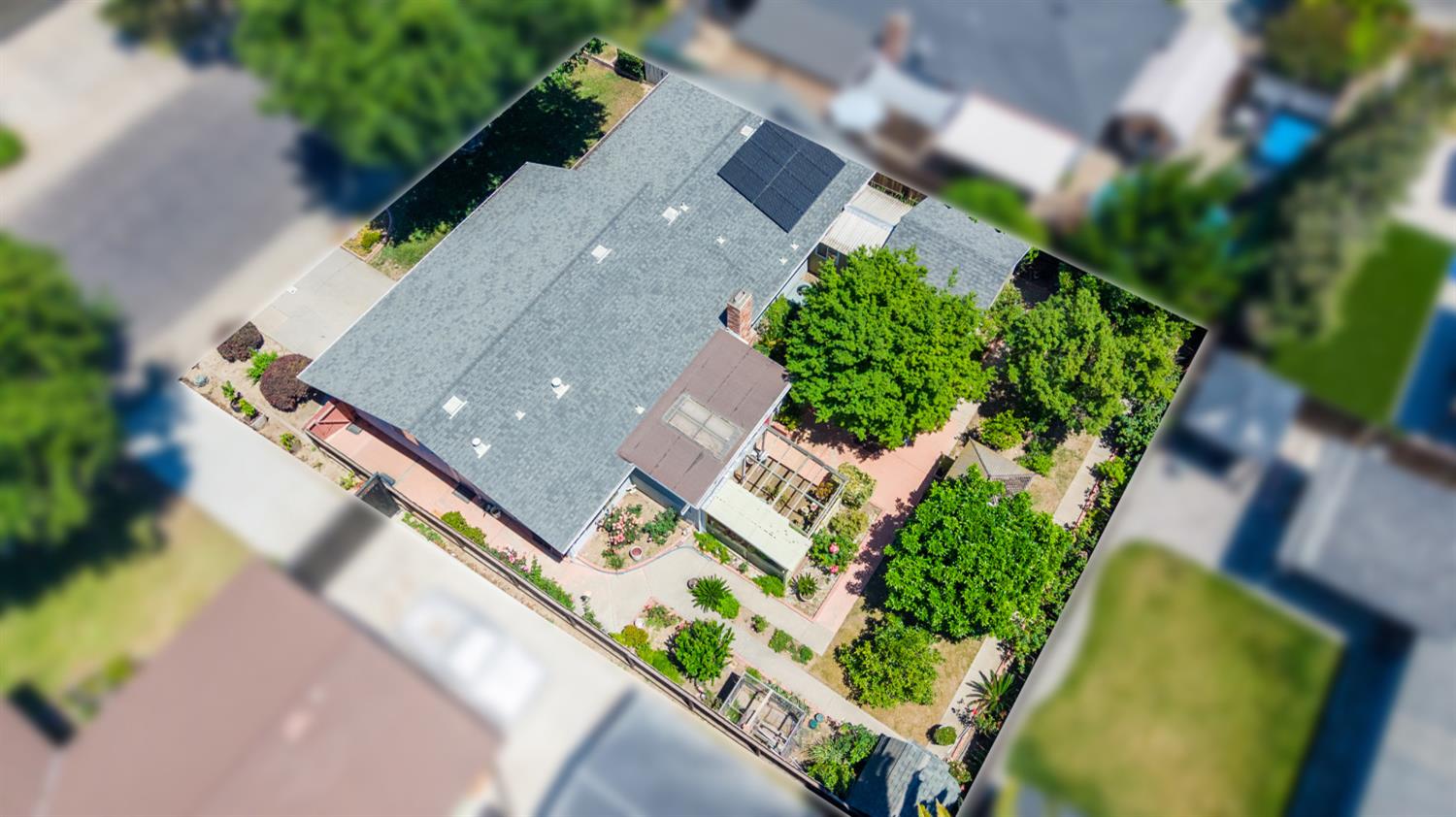 3356 Ocotillo Way Modesto, CA 95355 - Photo 31 of 33 an aerial view of a house with a yard and garden