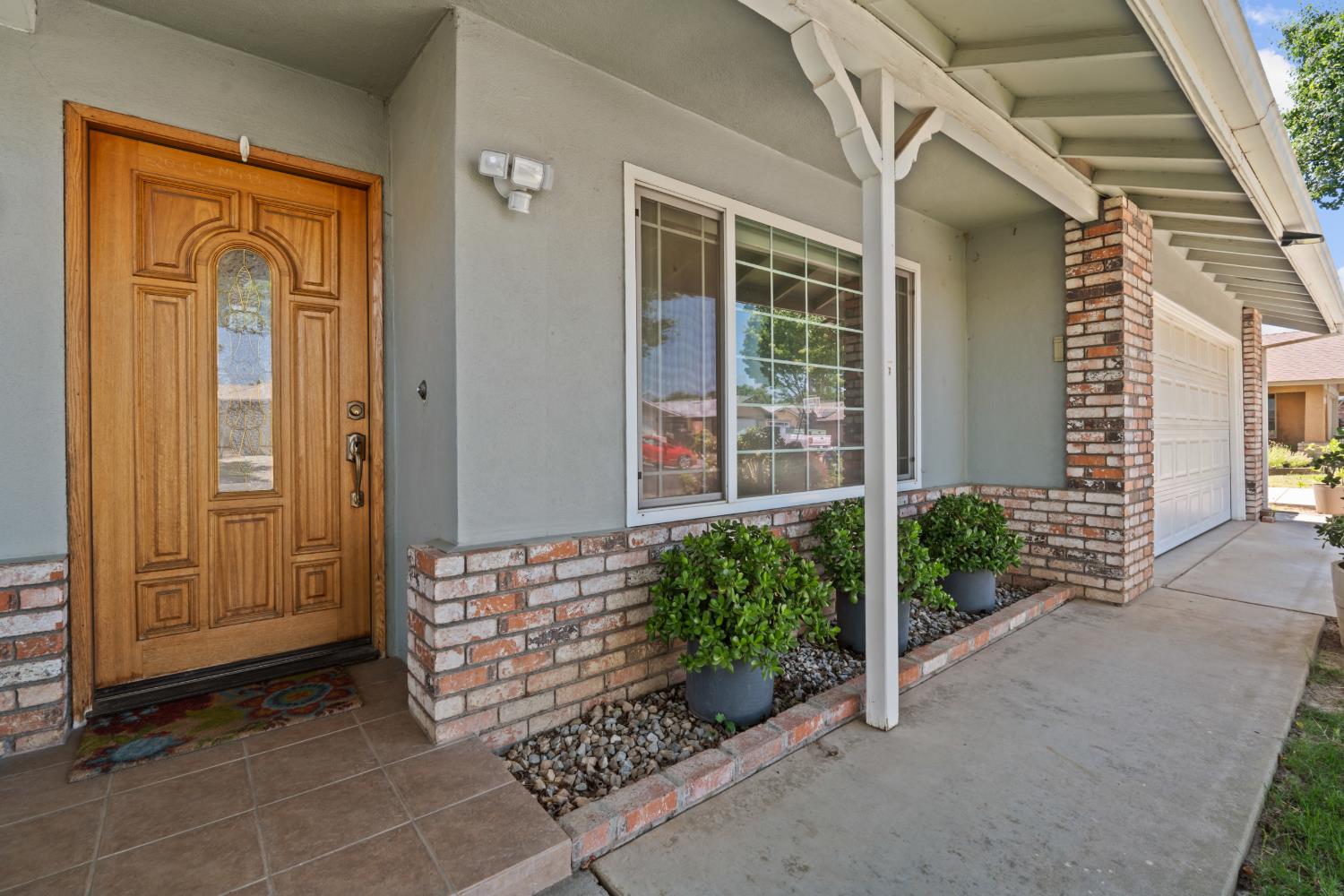 3356 Ocotillo Way Modesto, CA 95355 - Photo 5 of 33 a front view of a house with a garage