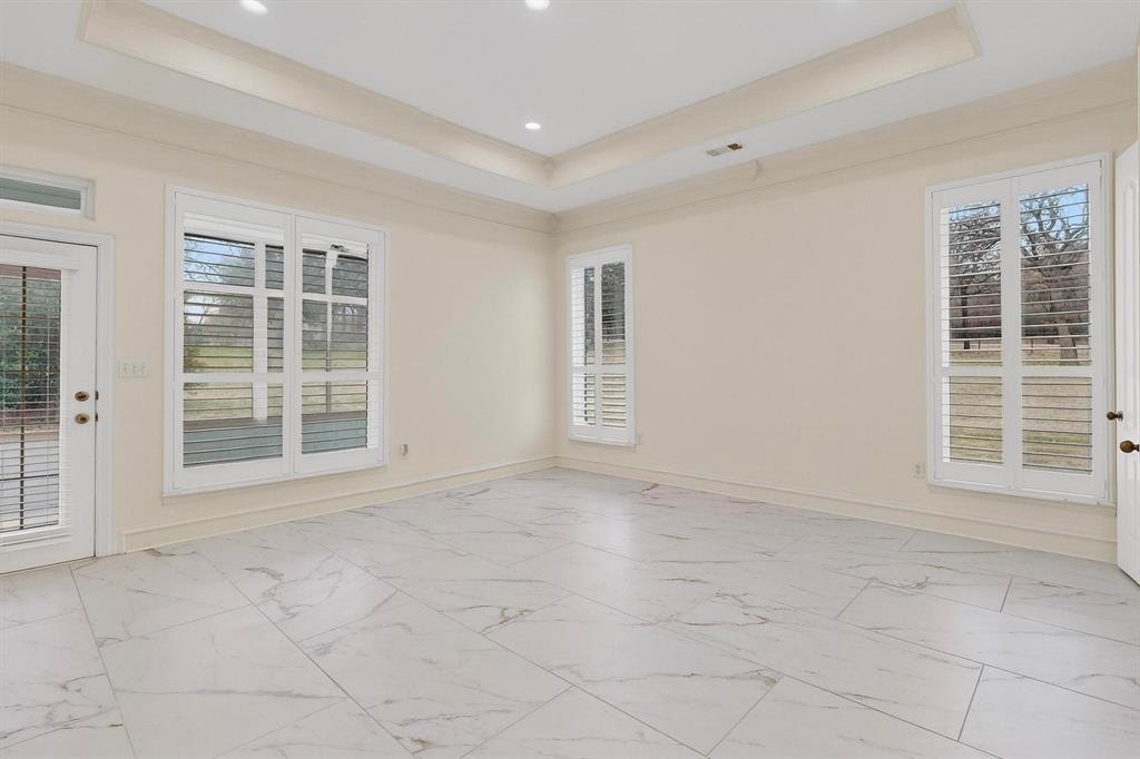 531 East Hickory Ridge Circle Argyle, TX 76226 - Photo 17 of 37 a view of an empty room with a window
