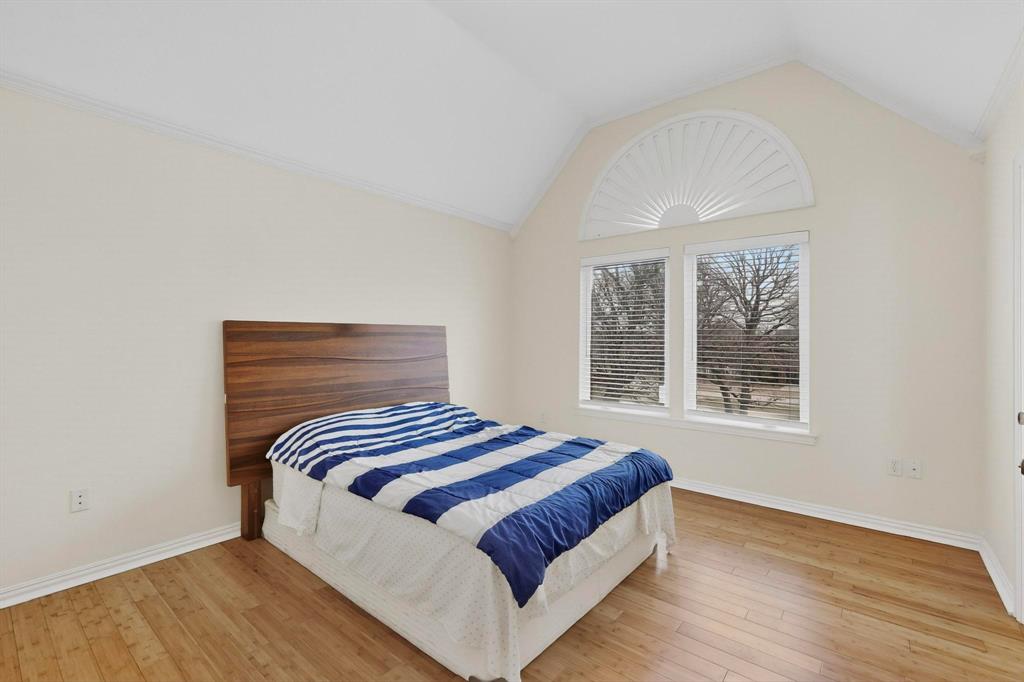 531 East Hickory Ridge Circle Argyle, TX 76226 - Photo 20 of 37 a bedroom with a bed and a window