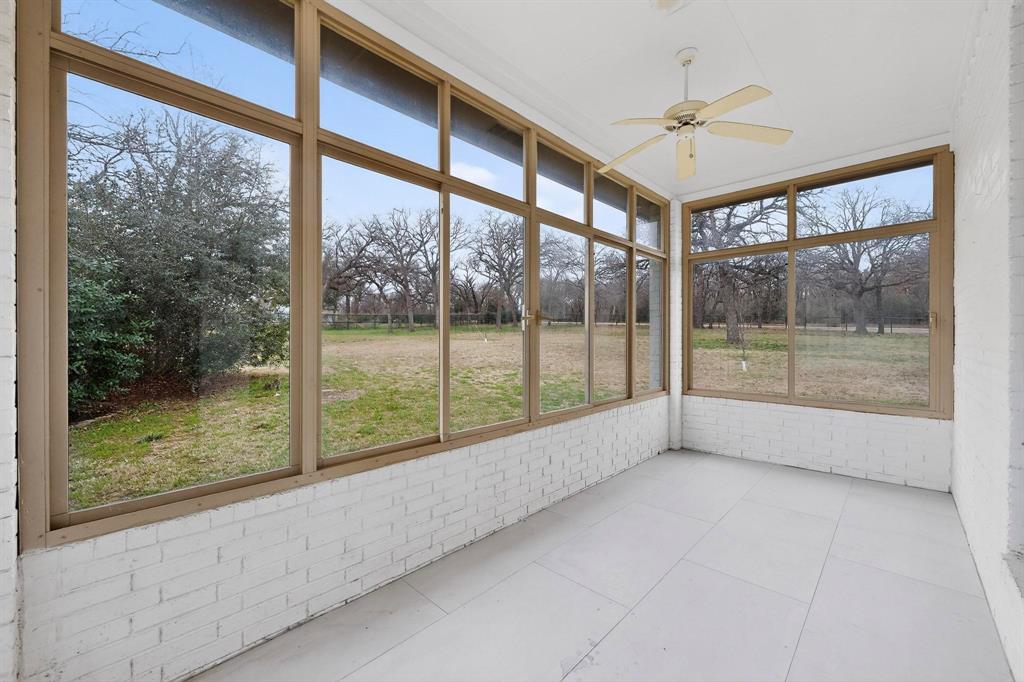 531 East Hickory Ridge Circle Argyle, TX 76226 - Photo 29 of 37 a view of room with window and a ceiling fan