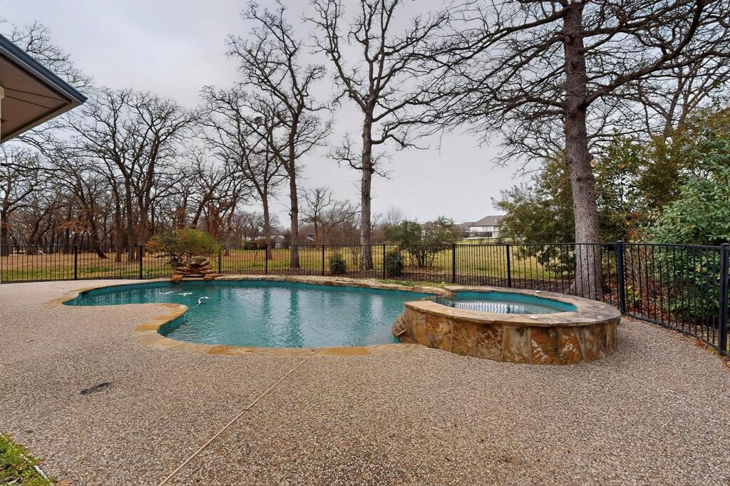 531 East Hickory Ridge Circle Argyle, TX 76226 - Photo 34 of 37 a view of a swimming pool with a patio