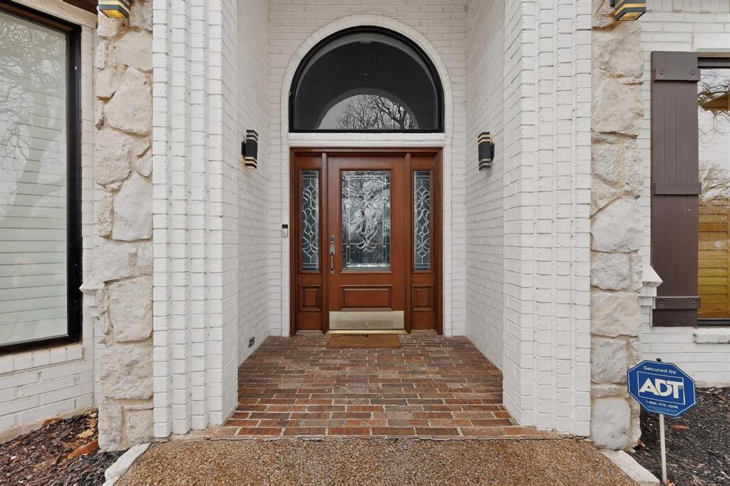 531 East Hickory Ridge Circle Argyle, TX 76226 - Photo 4 of 37 a front view of a house with a shower