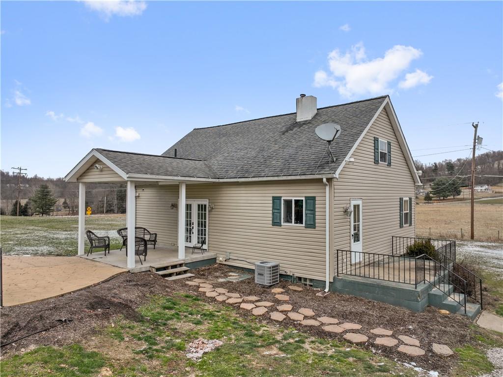 607 Fayette City Road Perryopolis, PA 15473 - Photo 2 of 31 a front view of a house with a yard