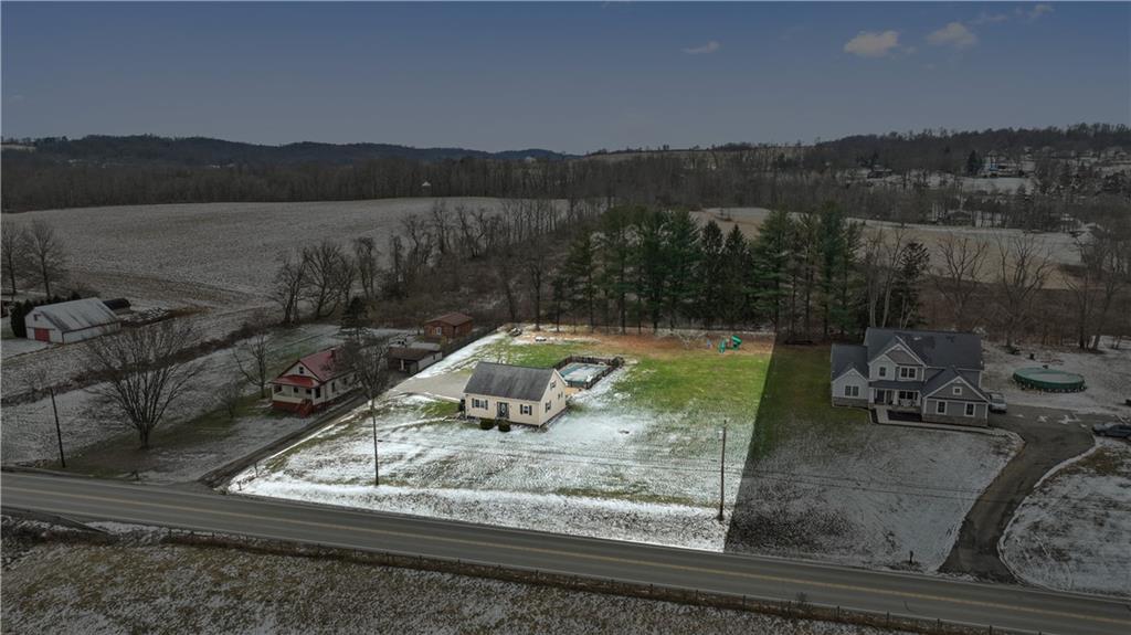 607 Fayette City Road Perryopolis, PA 15473 - Photo 27 of 31 a view of a backyard with mountain view and lake view