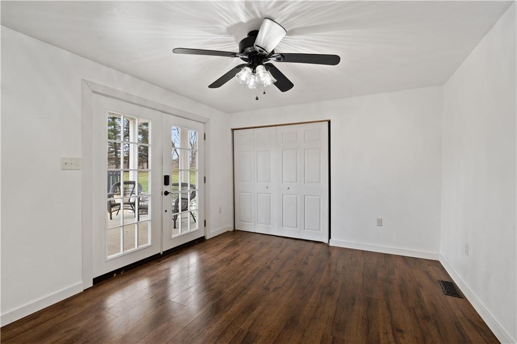 607 Fayette City Road Perryopolis, PA 15473 - Photo 7 of 31 a view of empty room with wooden floor