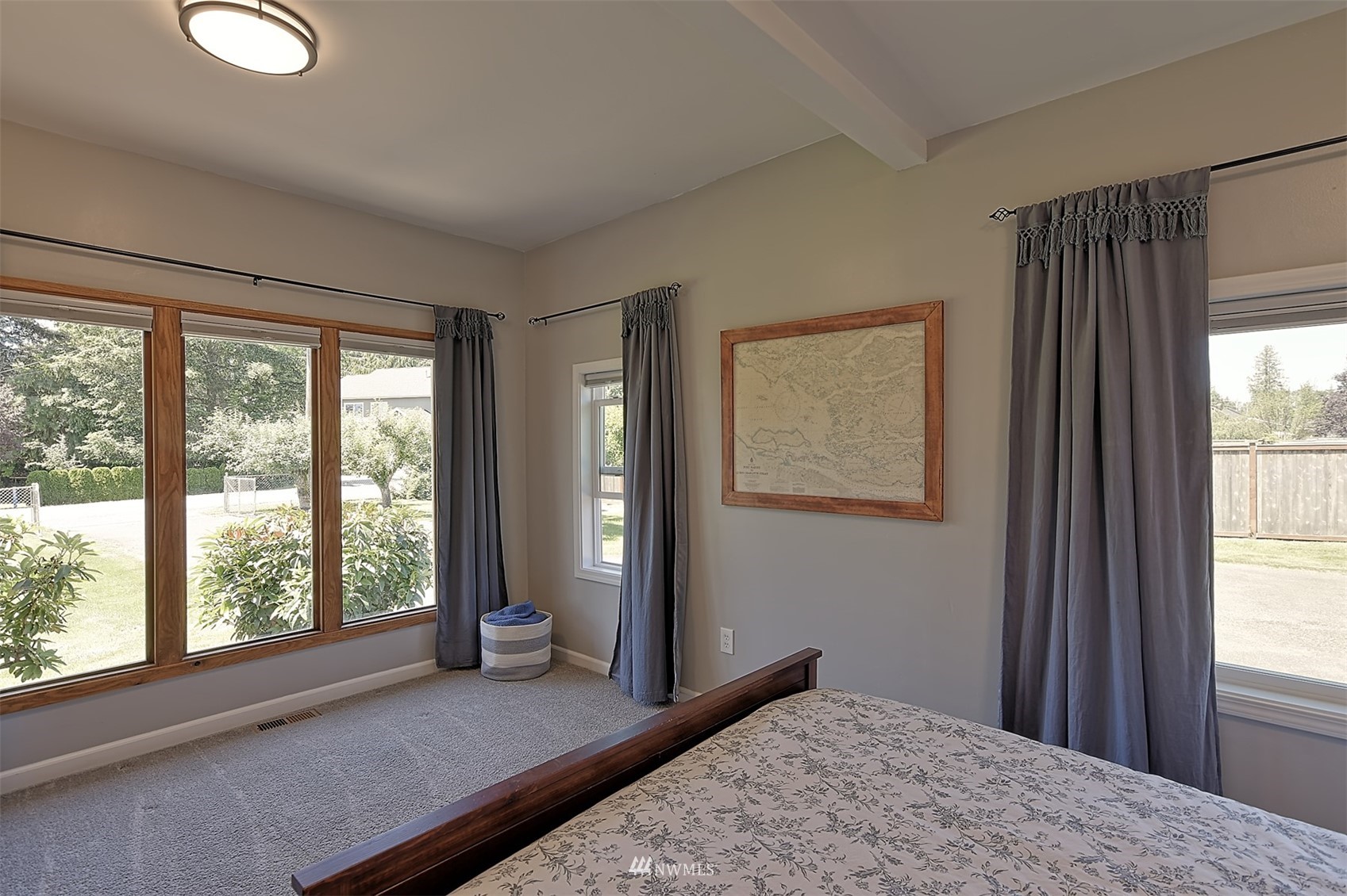 2209 Cedar Road Lake Stevens, WA 98258 - Photo 23 of 40 a view of a room with a large bed and wooden floor
