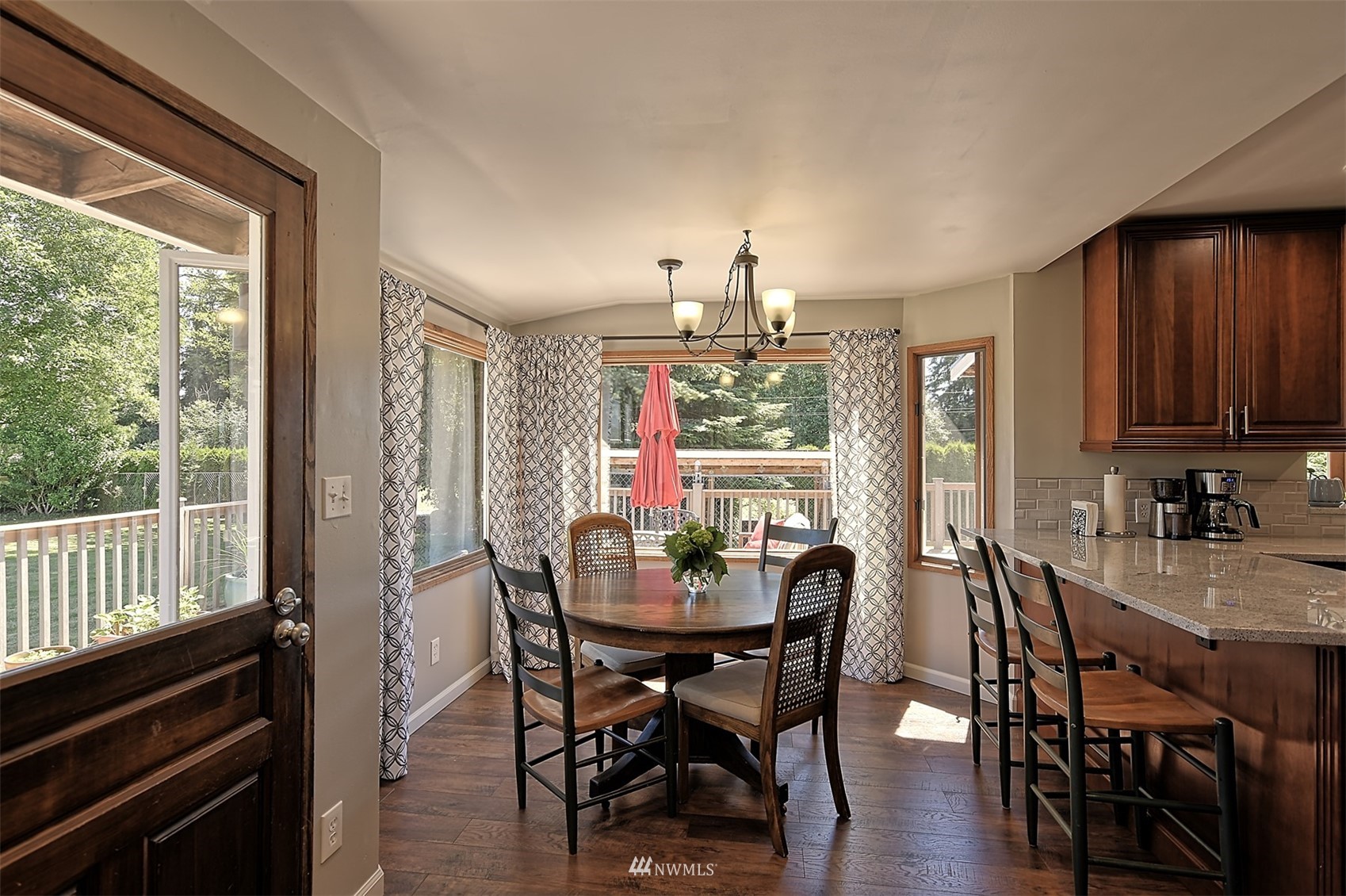 2209 Cedar Road Lake Stevens, WA 98258 - Photo 10 of 40 a view of a dining room with furniture window and outside view