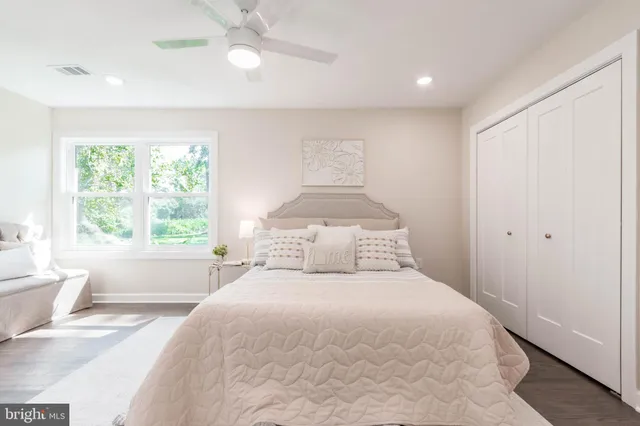 a view of room with window and hardwood floor