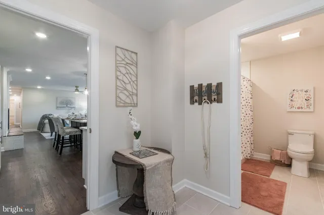 a view of a garden with wooden fence
