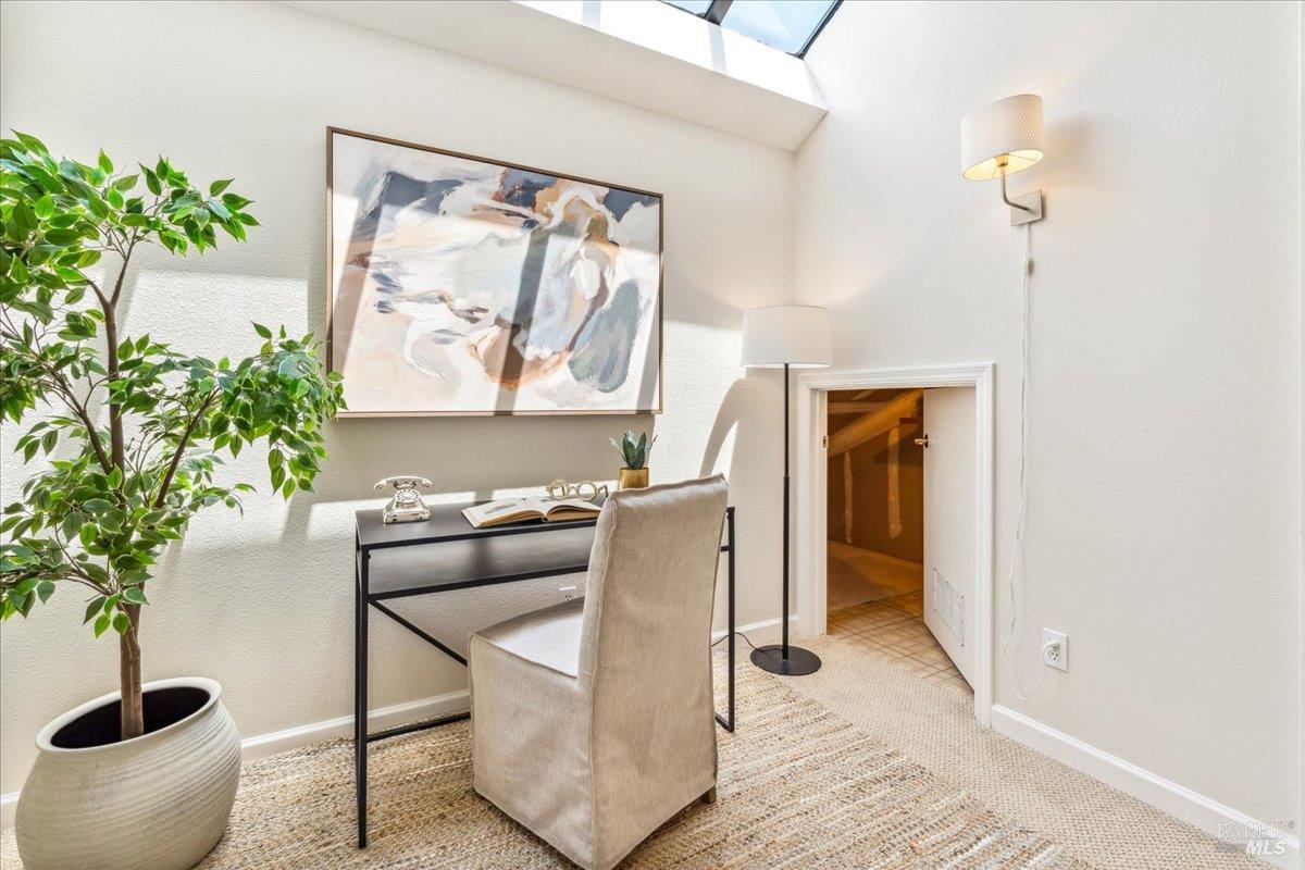 106 Posada Del Sol Novato, CA 94949 - Photo 22 of 27 a living room with furniture and a potted plant