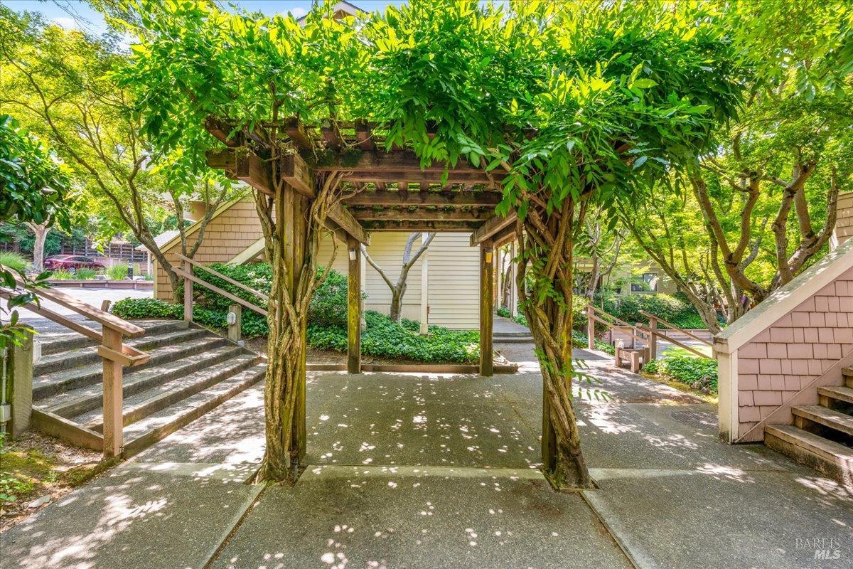 106 Posada Del Sol Novato, CA 94949 - Photo 26 of 27 a view of a street with a tree
