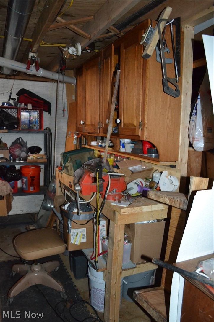 9590 Root Road Columbia Station, OH 44028 - Photo 25 of 31 Work bench in basement