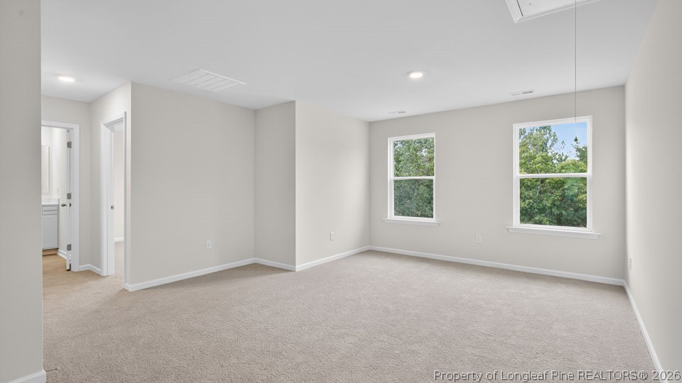 152 Charlies Bnd Way Spring Lake, NC 28390 - Photo 16 of 34 an empty room with windows and closet