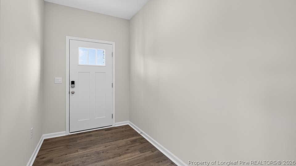 152 Charlies Bnd Way Spring Lake, NC 28390 - Photo 2 of 34 a view of an empty room with wooden floor