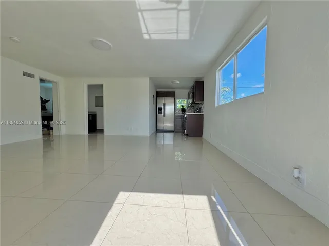 a kitchen with a stove and a microwave