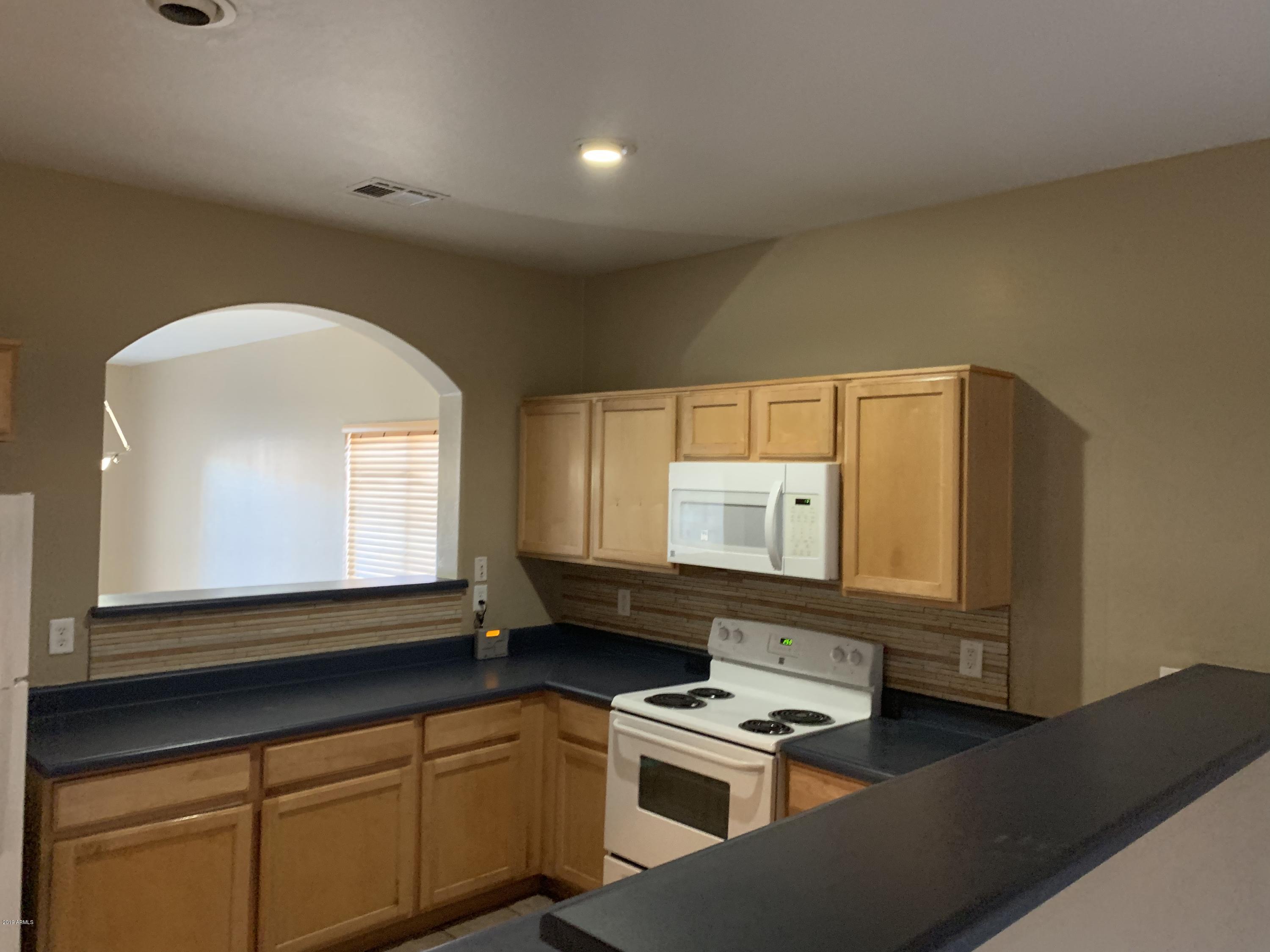 1108 West Carson Road Phoenix, AZ 85041 - Photo 6 of 33 IMG_3307