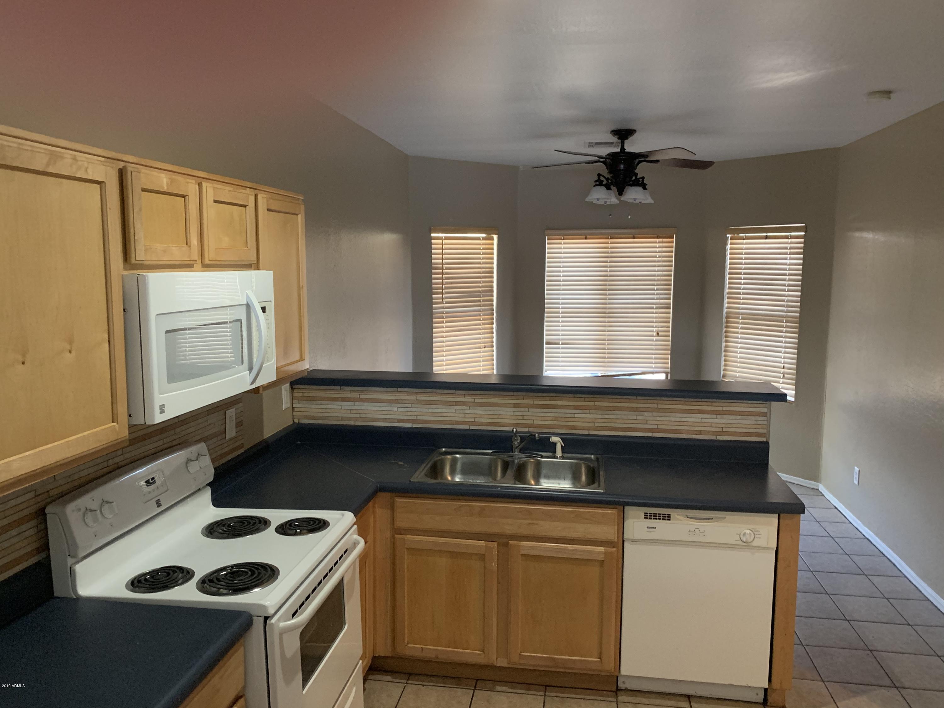 1108 West Carson Road Phoenix, AZ 85041 - Photo 10 of 33 IMG_3309