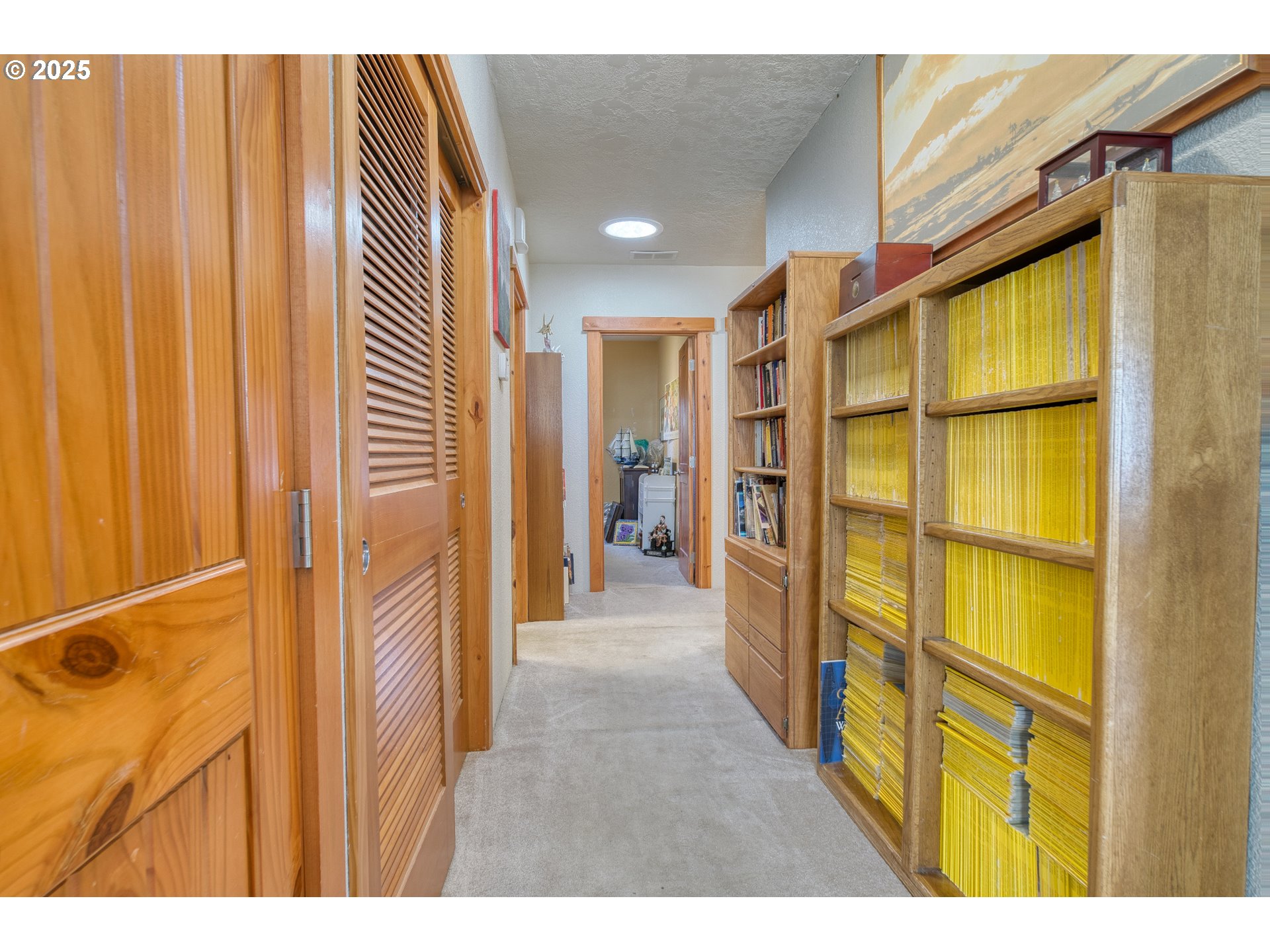 32673 Pittsburg Road St. Helens, OR 97051 - Photo 19 of 47 a view of a hallway with wooden floor