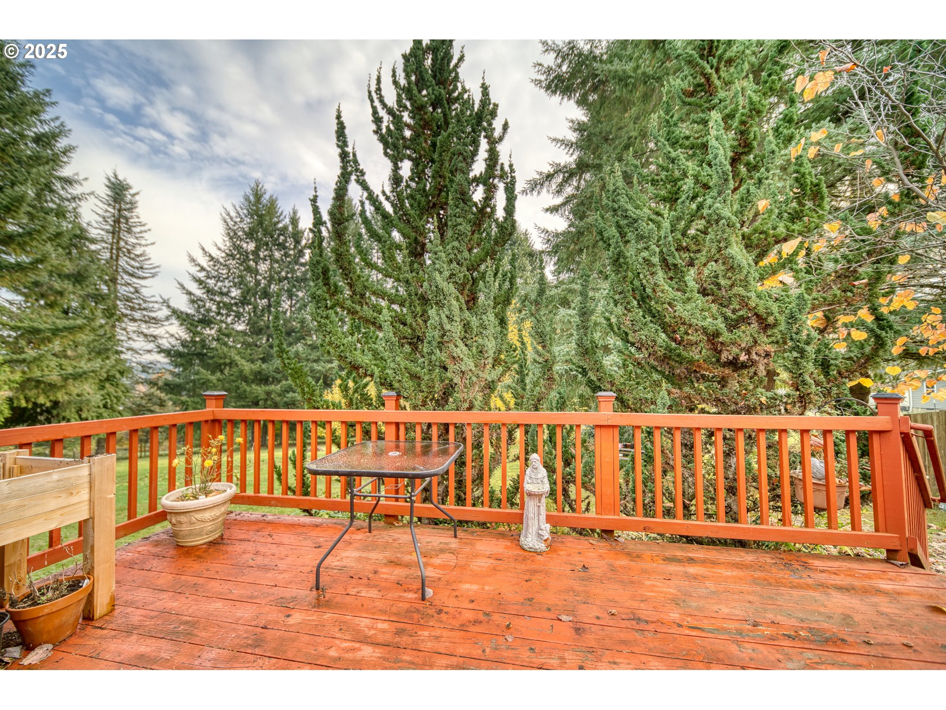 32673 Pittsburg Road St. Helens, OR 97051 - Photo 35 of 47 a view of a deck with two chairs and wooden fence