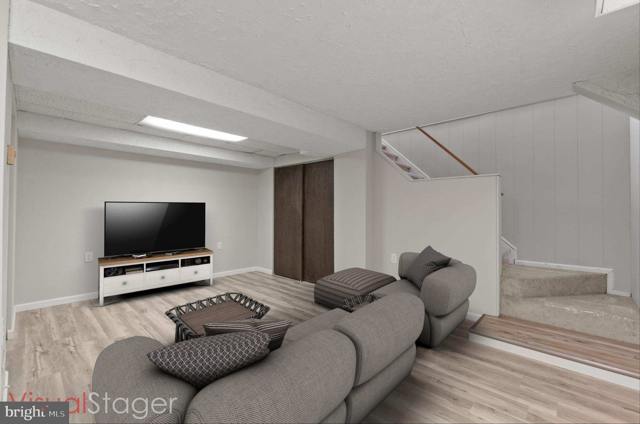 8617 Sherington Road Nottingham, MD 21236 - Photo 16 of 36 Recreation Room - NEW Luxury Vinyl Plank Floor