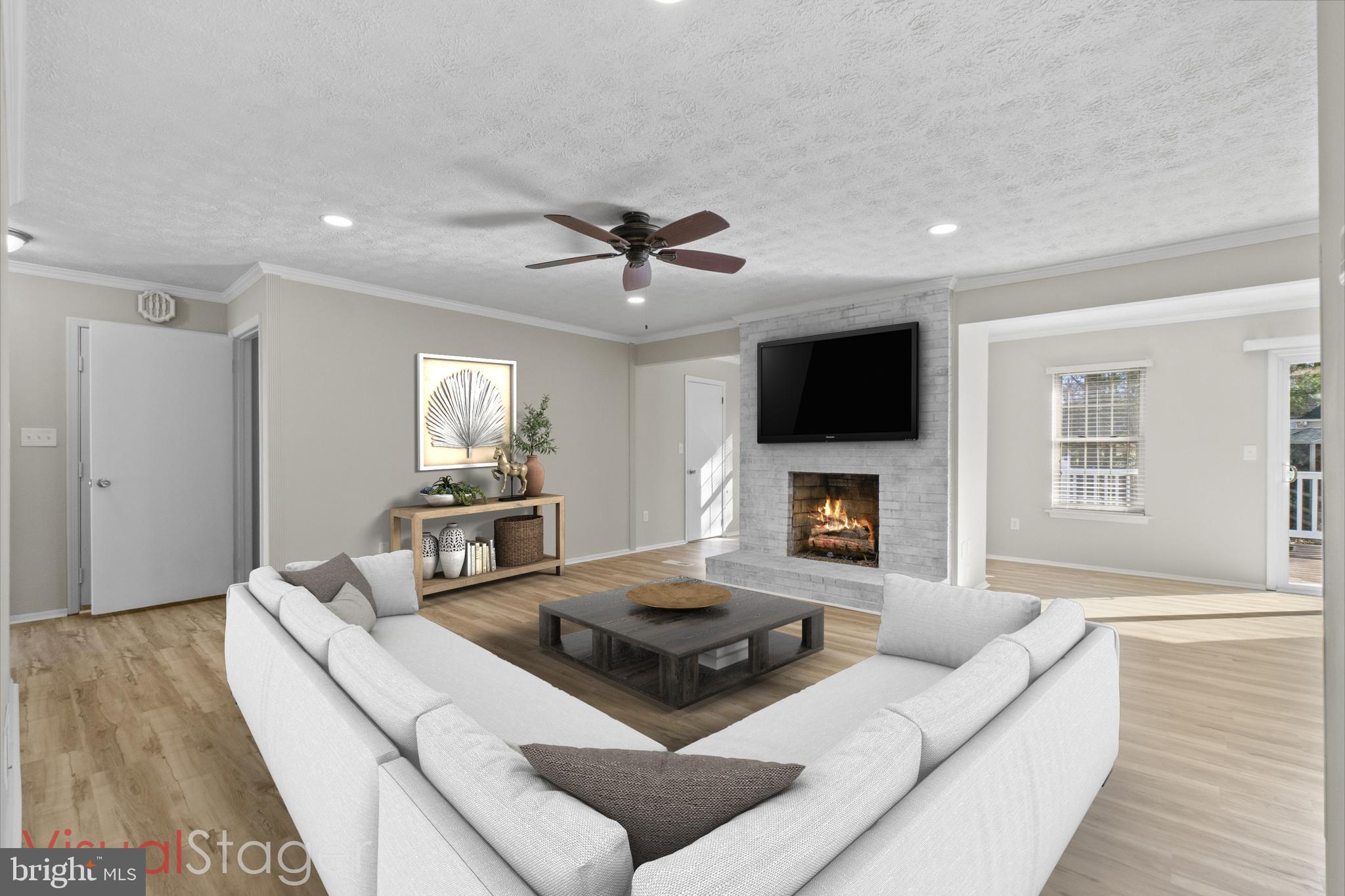 8617 Sherington Road Nottingham, MD 21236 - Photo 3 of 36 Family Room- Fireplace, NEW Luxury Vinyl Floor LVP