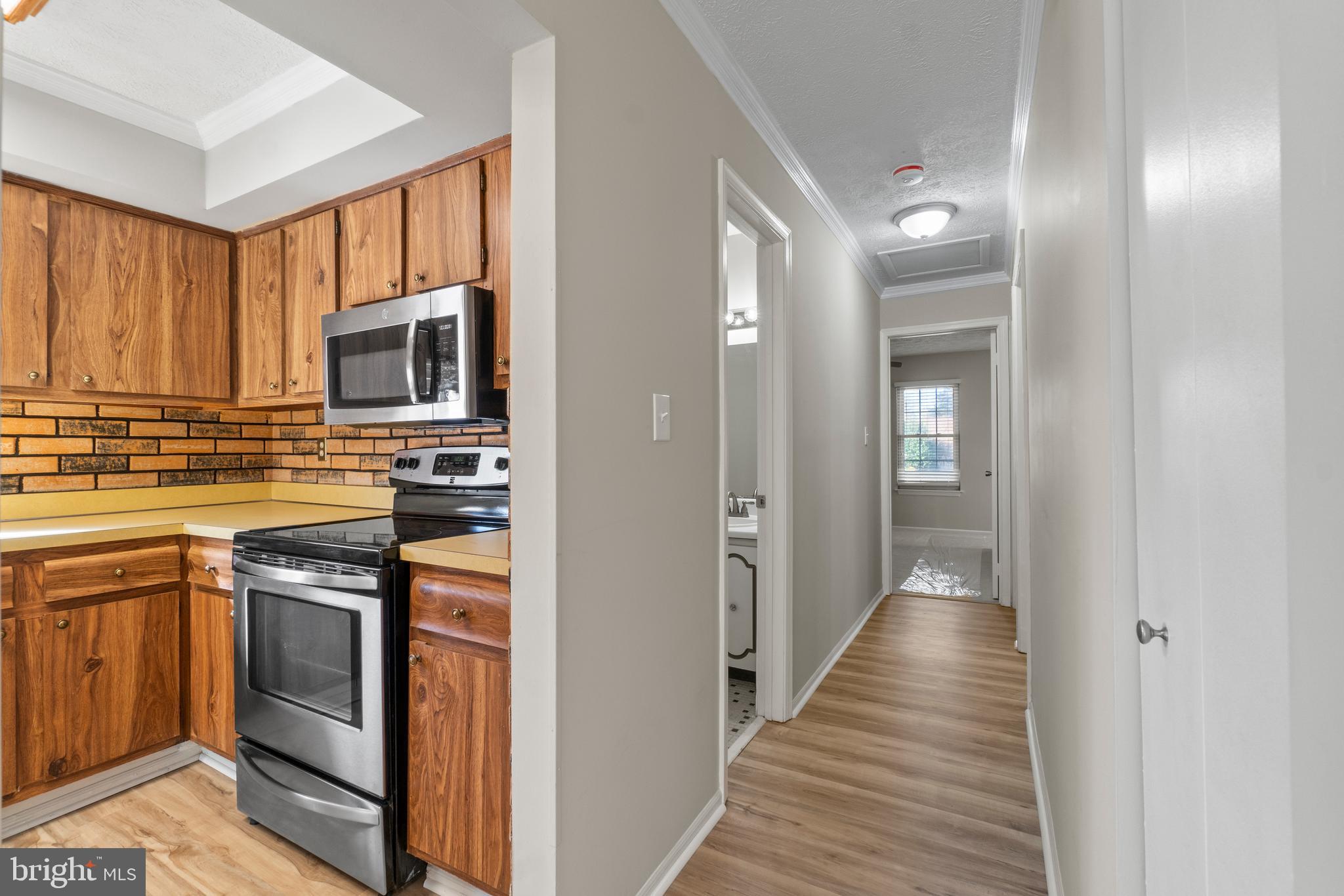 8617 Sherington Road Nottingham, MD 21236 - Photo 9 of 36 Hallway To Bedrooms & Bathrooms - NEW LVP Floor