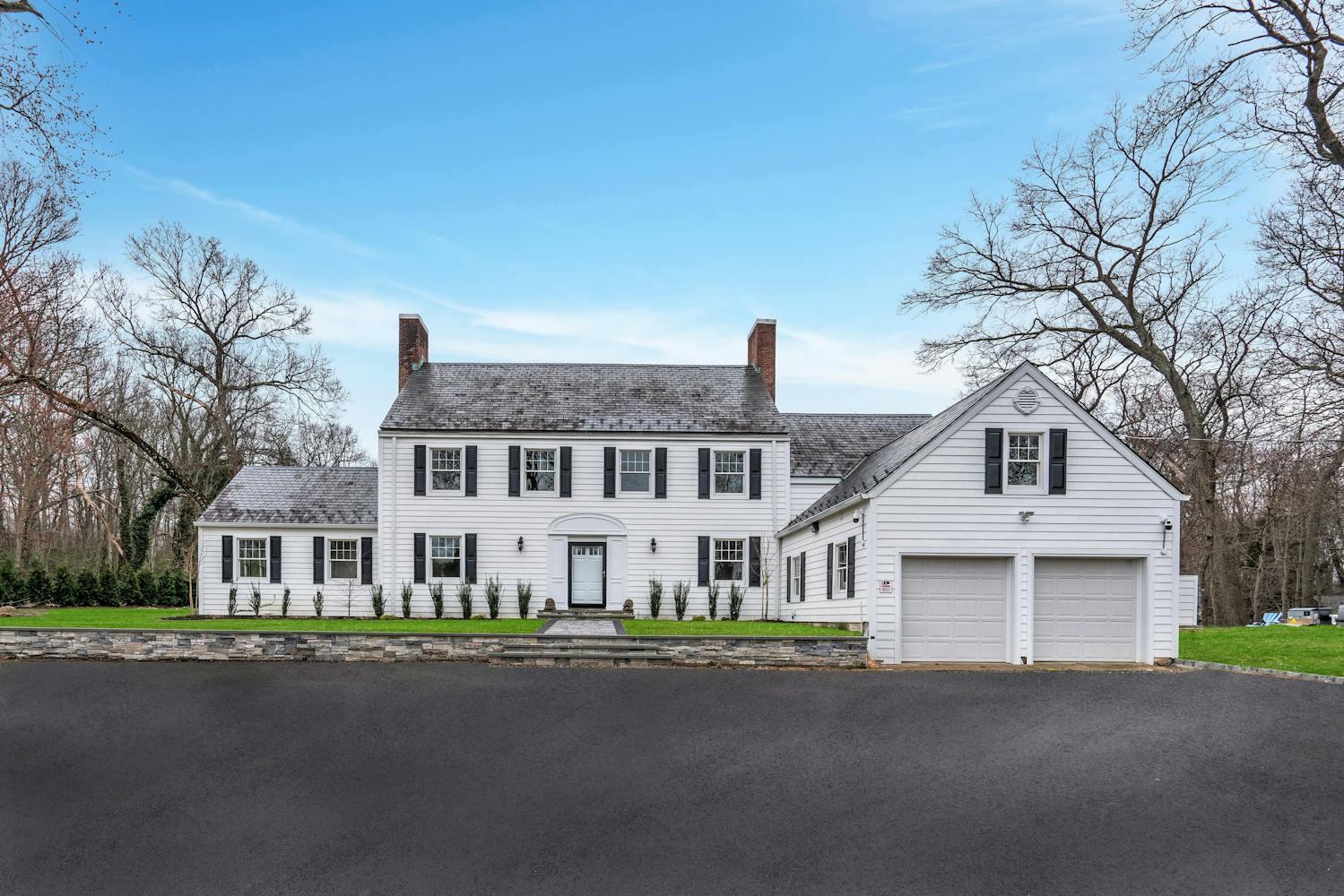 539 Split Rock Road Syosset, NY 11791 - Photo 2 of 40 front view of house with a street