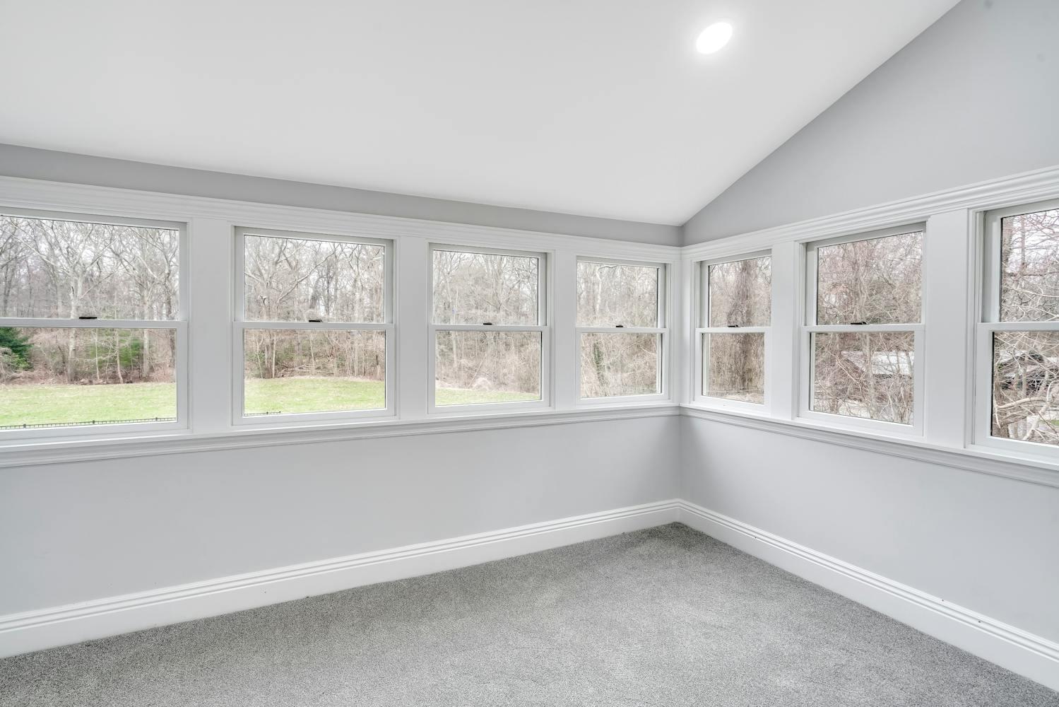 539 Split Rock Road Syosset, NY 11791 - Photo 28 of 40 an empty room with a window