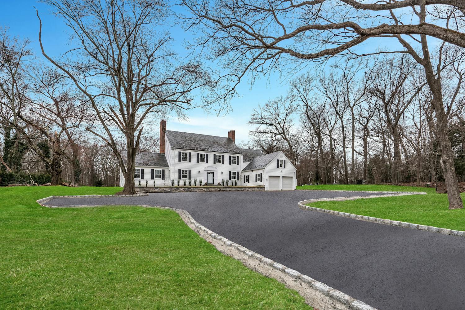 539 Split Rock Road Syosset, NY 11791 - Photo 3 of 40 a view of a house with a yard