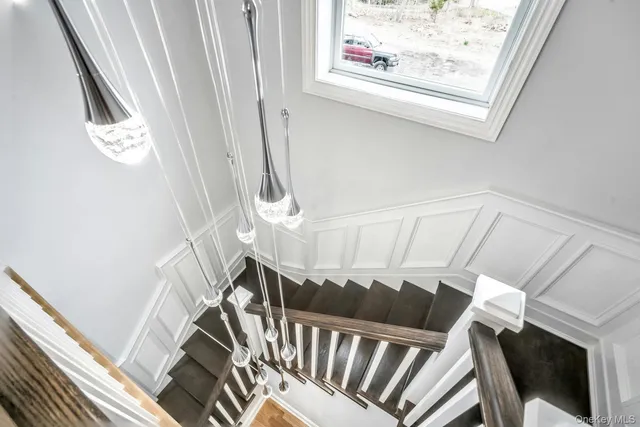 a view of entryway with wooden floor