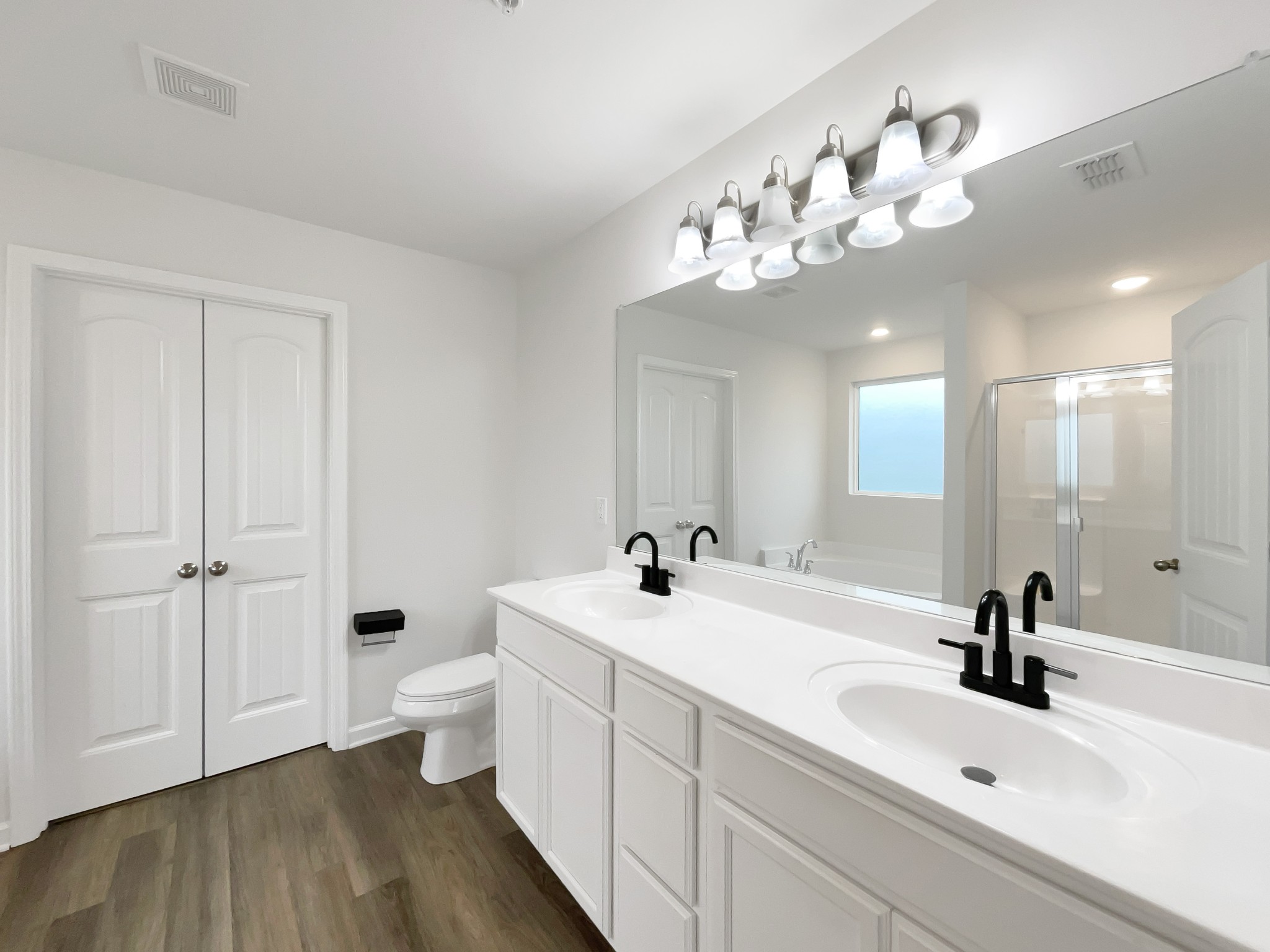 203 Fount Hackney Lane Murfreesboro, TN 37129 - Photo 16 of 26 a bathroom with a sink a toilet and mirror