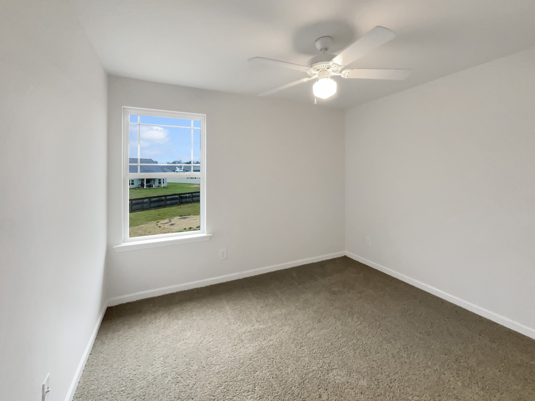 203 Fount Hackney Lane Murfreesboro, TN 37129 - Photo 18 of 26 an empty room with a window