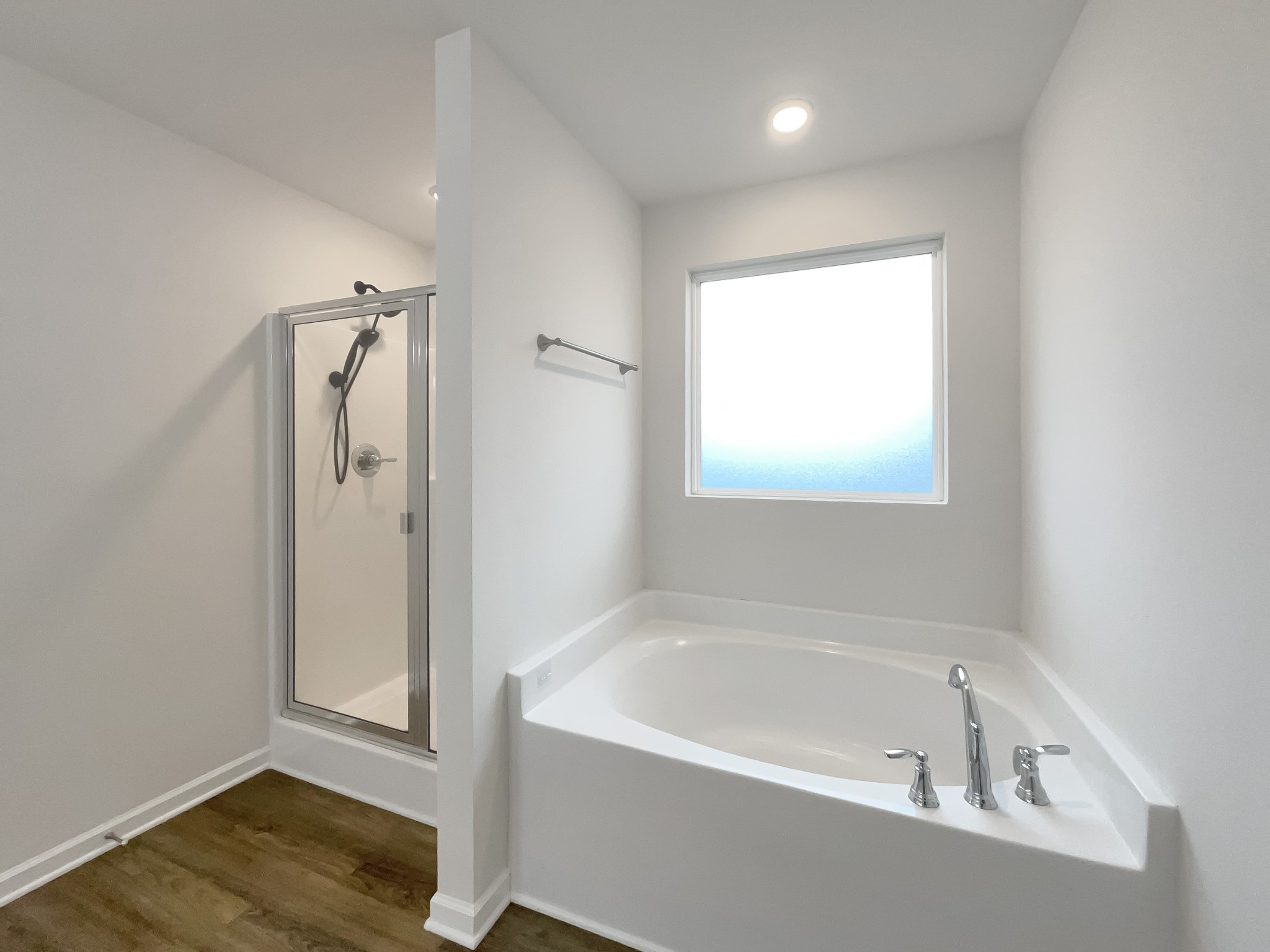 203 Fount Hackney Lane Murfreesboro, TN 37129 - Photo 6 of 26 a white bath tub sitting next to a shower