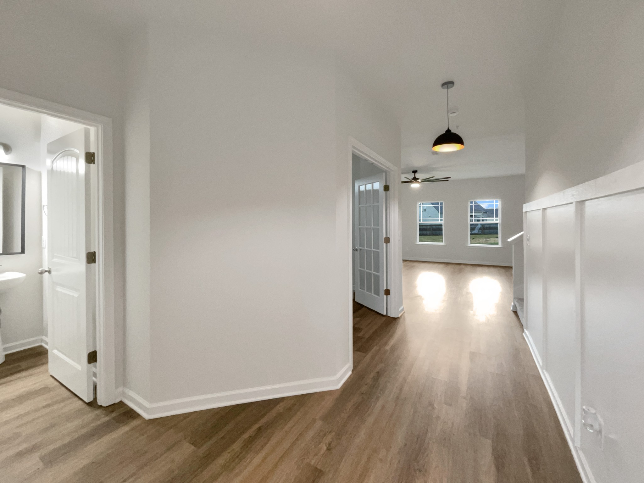 203 Fount Hackney Lane Murfreesboro, TN 37129 - Photo 8 of 26 a view of a hallway with wooden floor