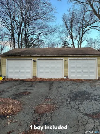 a front view of house with a garage