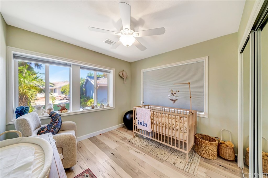 6720 Kurl Way Reseda, CA 91335 - Photo 23 of 40 a bedroom with a bed and a large window