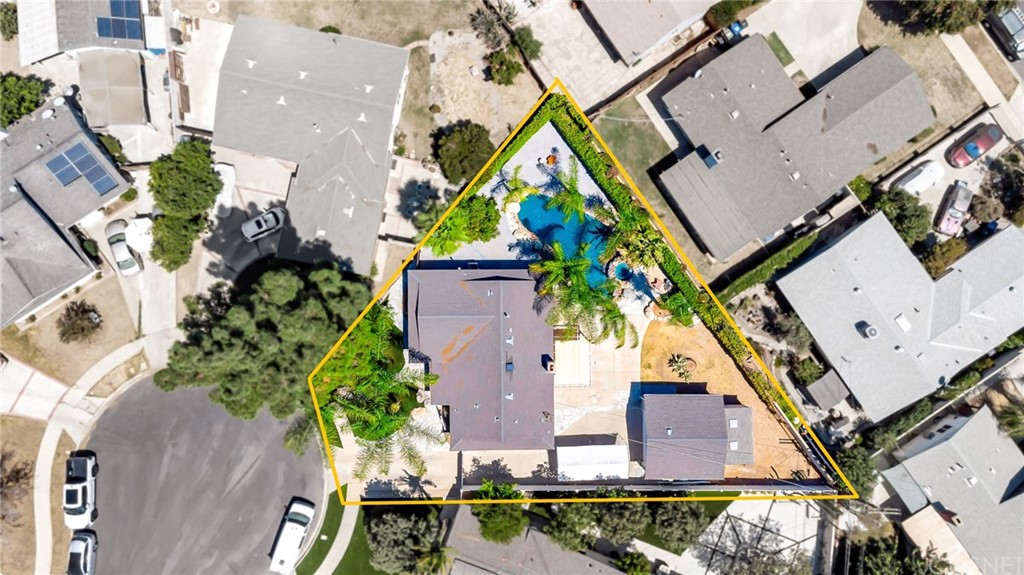 6720 Kurl Way Reseda, CA 91335 - Photo 5 of 40 an aerial view of a house with a yard and garden