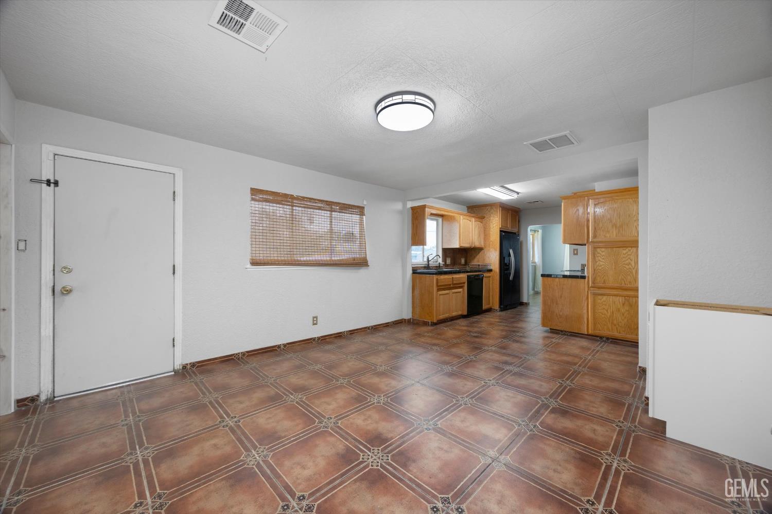 Undisclosed Address Bakersfield, CA 93305 - Photo 12 of 33 a view of a kitchen with a sink