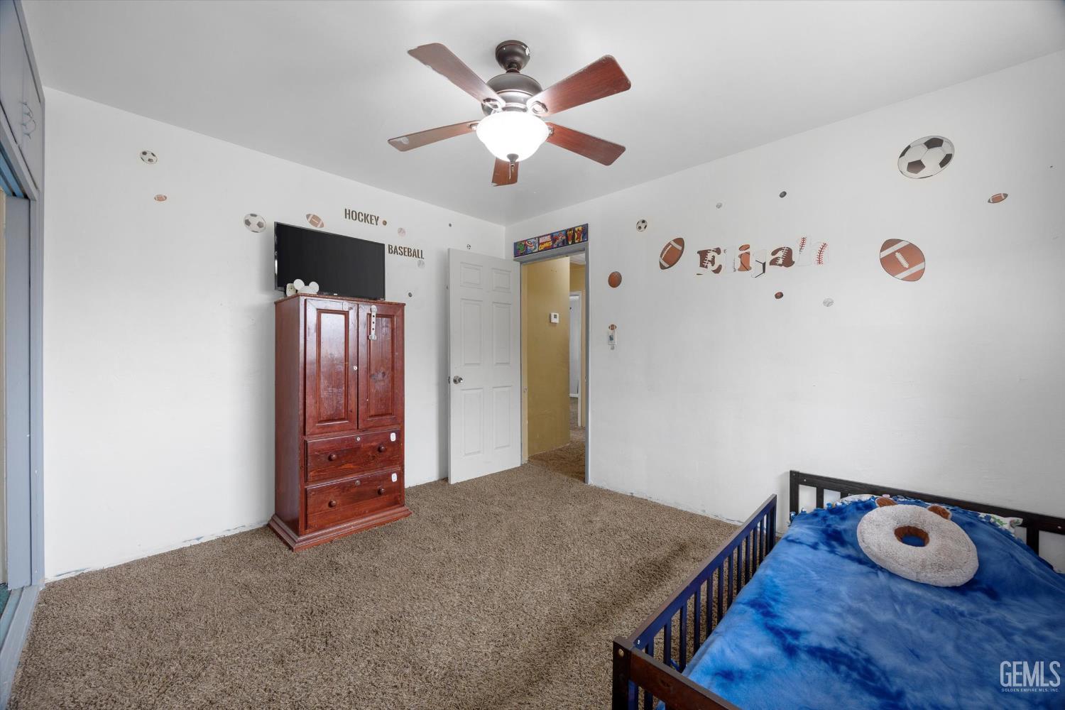 Undisclosed Address Bakersfield, CA 93305 - Photo 23 of 33 a view of livingroom with furniture and wooden floor