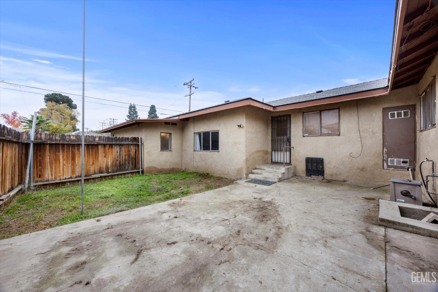 Undisclosed Address Bakersfield, CA 93305 - Photo 26 of 33 a view of a house with backyard